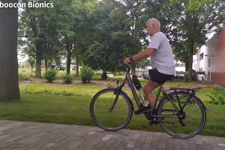 Cycling around with a powered knee prosthesis